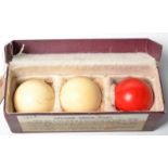 A set of three ivory billiard balls, diameter each 52mm. Weight 444g. Original box.