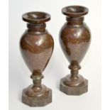 A pair of serpentine vases each with ovoid body and octagonal base. 27.3cm.