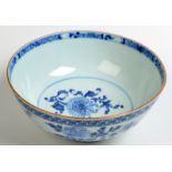 An 18th century Chinese blue and white bowl, diameter 23cm, hairline crack. Condition Report: