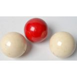 A set of three ivory billiard balls, diameter 54mm. Weight 451g.