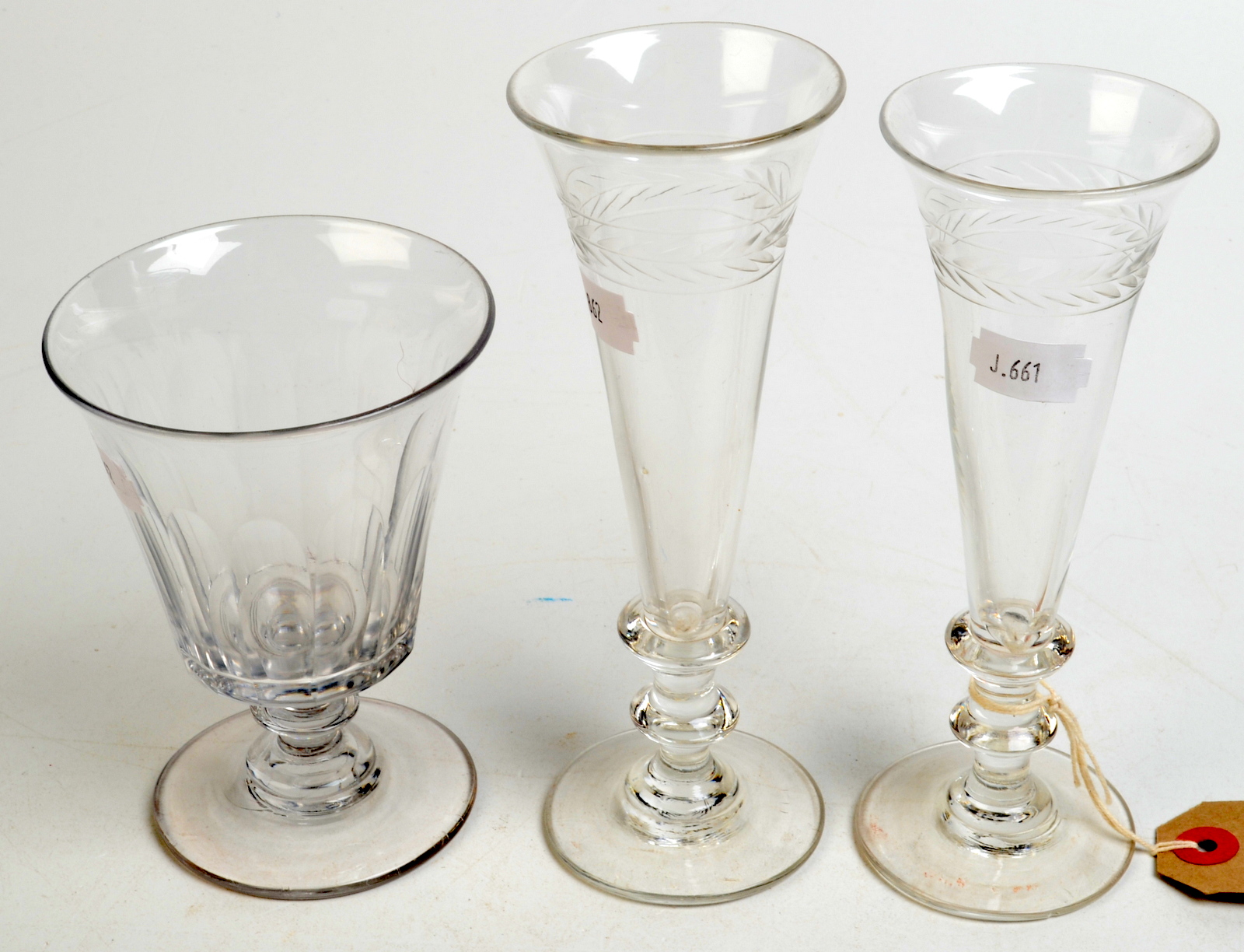A 19th century fluted rummer and a pair of ale flutes.