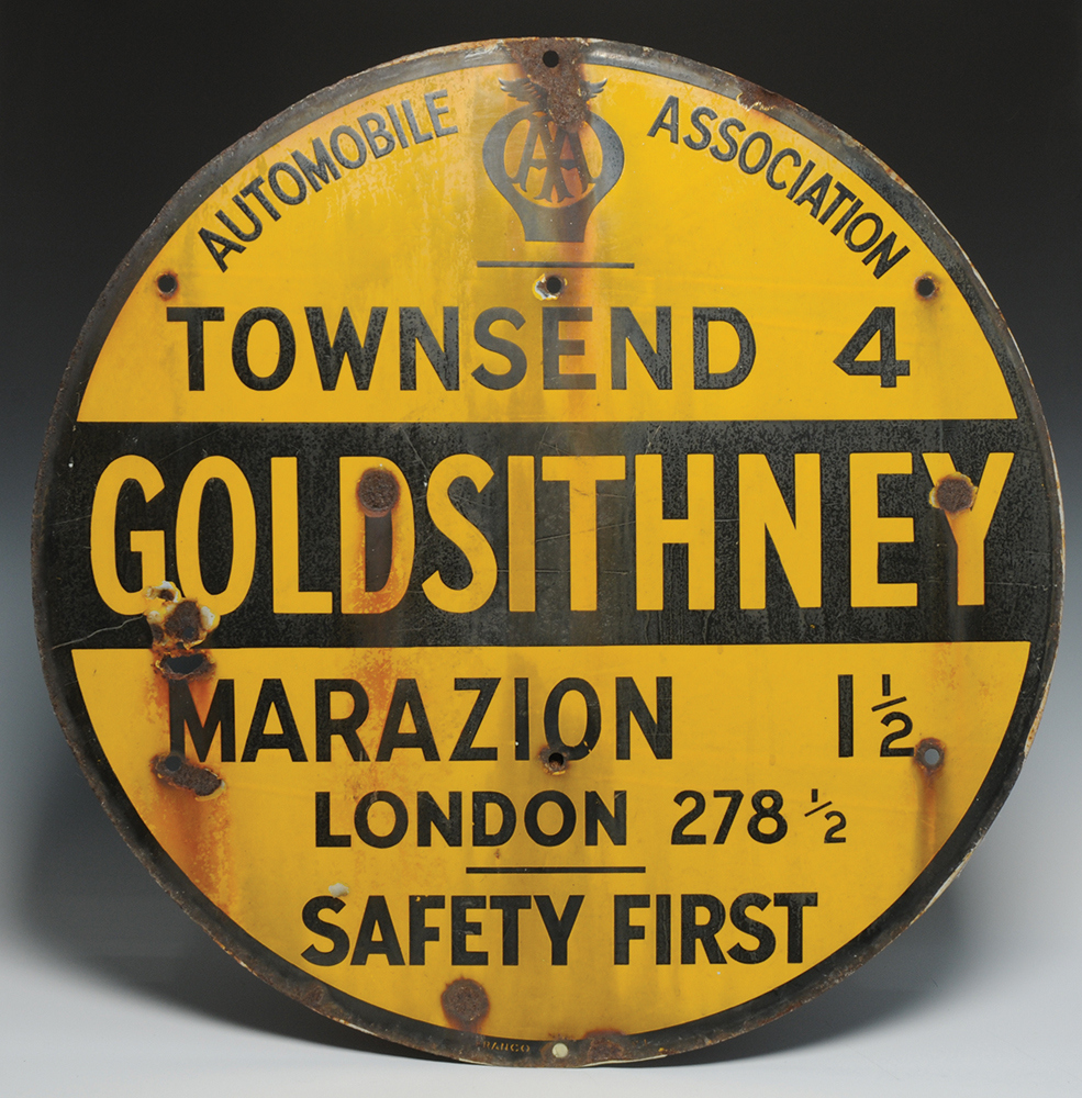 An enamelled Automobile Association, Safety First, yellow and black circular sign,