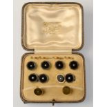 A gold, black enamel and pearl dress set, comprising a pair of cufflinks,