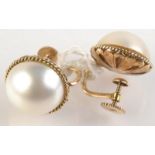 A pair of 14ct. gold and Maby pearl earrings.