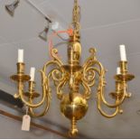 A set of three impressive brass six branch chandeliers in Dutch taste. Condition Report: All good