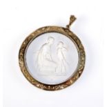 A diamond set, reverse intaglio crystal pendant. Condition Report: 3.9 cm. diameter