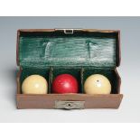 A set of three ivory billiard balls, diameter 50mm. Weight 391g. With good leather carrying case.