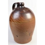 A large 19th century salt glazed stoneware jar, named Rashleigh, Falmouth. Height 46cm.