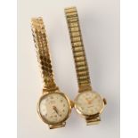 Two gold cased ladies watches.