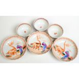 A set of three, 18th century Chinese, fluted tea bowls and saucers.