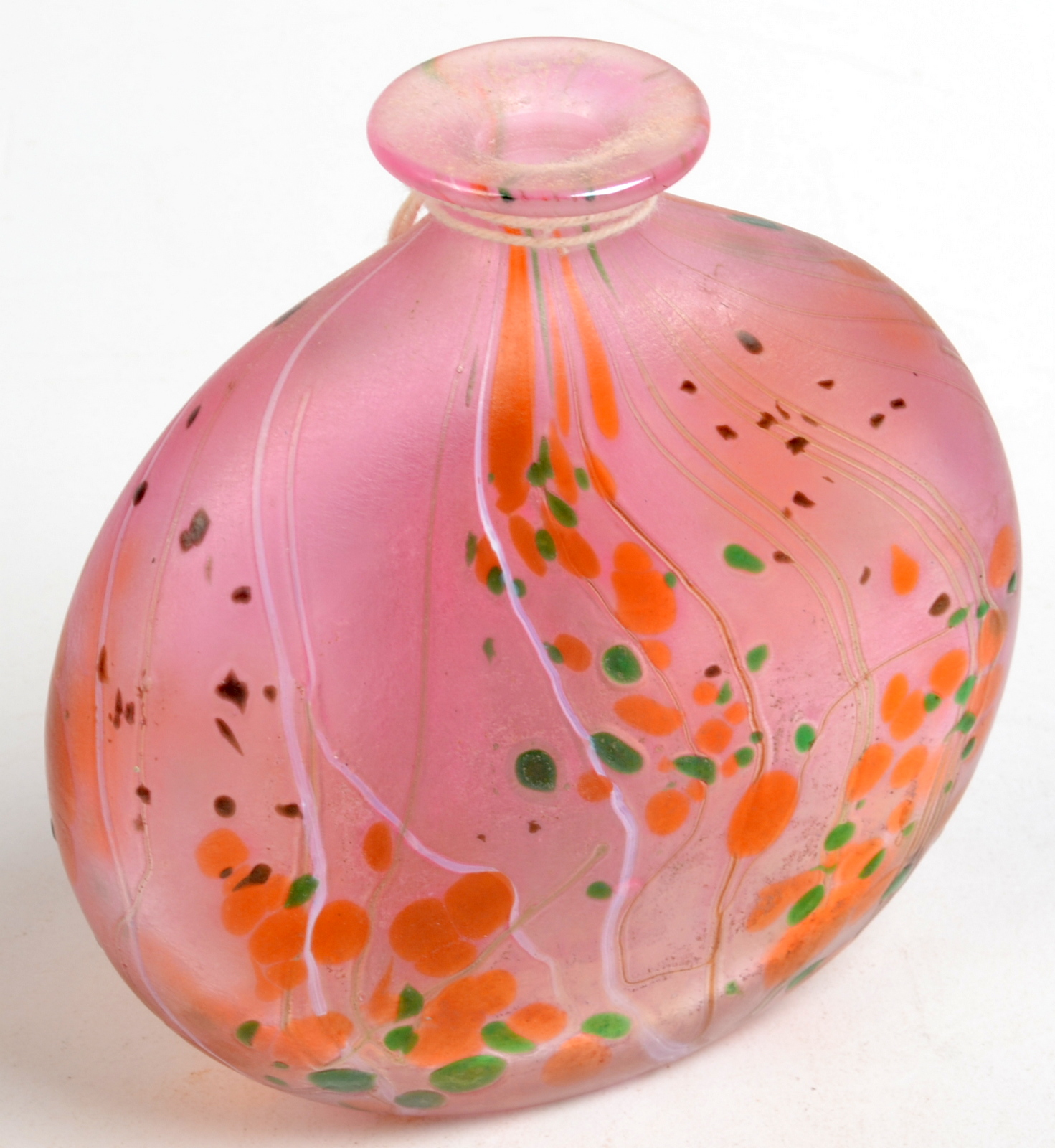 A studio glass iridescent bottle in the style of Clarke.