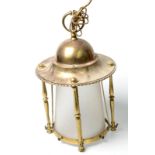 A brass hall lantern with tapering glass sleeve to top of suspension ring 40cm.  Condition Report: