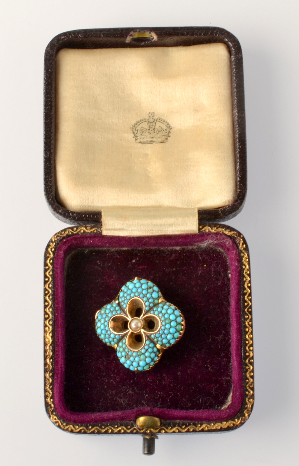 A Victorian quatrefoil gold pendant/brooch pave set with turquoise about a central pearl. - Image 2 of 2