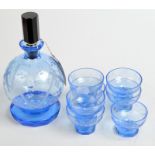 A Czechoslovakian blue glass, Art Deco decanter and seven matching glasses.