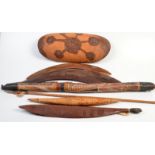 An Aboriginal collection including three boomerangs.
