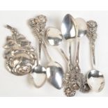 German silver coloured metal coffee spoons and a pendant.