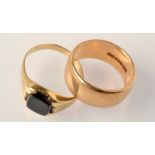 A 9ct. gold band and a 9ct. gold signet ring. Condition Report: The gold band is Q/R and the