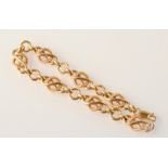 A 9ct. gold fancy link bracelet, 20.5g.