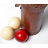 A set of three ivory billiard balls. Diameter 51mm, 2 x 52.5mm. Weight 420g. Original box.