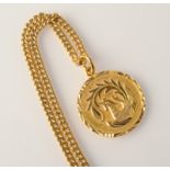 A very high purity Chinese gold phoenix and dragon pendant and chain, oriental marks, 55.6g.