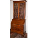 A mahogany straight front bureau bookcase