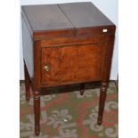 An oak commode with double hinged top, width 50cm.  Condition Report: Good condition for age,