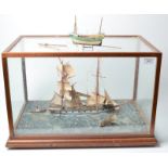 A scale diorama with a clipper, a pilot boat and a steam tug, in glazed mahogany case. width 58.