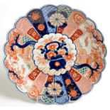 A Japanese Imari scalloped, shallow bowl.  Diameter 31cm.