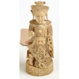 A late 18th century or early 19th century Chinese export chess piece carved as a warrior,