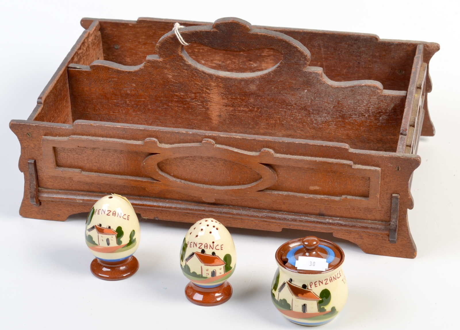 A cutlery tray and a Devon pottery Penzance souvenir cruet.