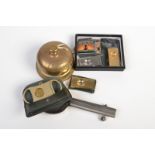 Cigar cutters and a tobacconists shop counter bell named E Nobel. Together with a cigar ash tray.