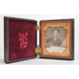 A daguerreotype portrait of a young gentleman in Union type case.