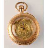 A gold cased, keyless fob watch, the chapter ring within a shield shaped reserve.