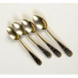A COLLECTION OF RUSSIAN SILVER

A set of four Russian export silver gilt teaspoons,