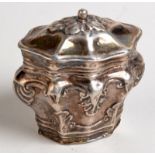A mid 19th century Dutch silver spice box of lobed design, embossed with acanthus leaves, height 4.
