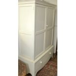 A painted pine wardrobe, the base with a single drawer, width 125cm. Condition Report: Condition