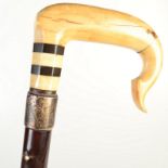 A good, late Victorian, snake wood walking cane, simulating a tree with ivory inlaid knots,