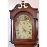 A thirty hour Georgian oak long case clock with swan neck pediment and painted dial,