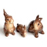 Three Beswick character rabbits.