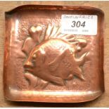 A Newlyn copper square fish decorated pin tray.