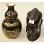 An African carved ebony female head and a Crown Staffordshire dark blue glaze double gourd vase,