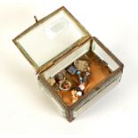 A glass and brass jewel box.