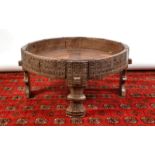 A Rajasthan carved low table, with bowl top.