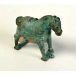 A bronze horse in archaic style, 11cm.