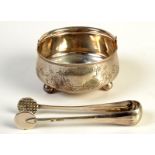 A COLLECTION OF RUSSIAN SILVER

A Russian silver swing handled sugar bowl with leaf,
