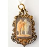 A filigree and canatille framed cameo pendant showing Medieval musicians.