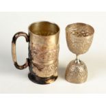 An Indian silver coloured metal double ended cup engraved with bands of foliage, 74gms,