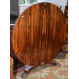 An early Victorian rosewood snap top table, with the counters carved column pedestal,