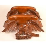 A pair of Victorian mahogany shelves, each with eagle carved bracket.