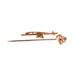 A dogs stick pin, a knop finial set of loose stones, together with a gold,